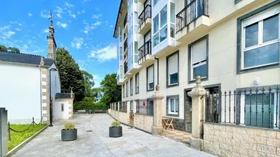 an empty street in front of a building at The Cliffs - AT Seiramar Sacido in Viveiro
