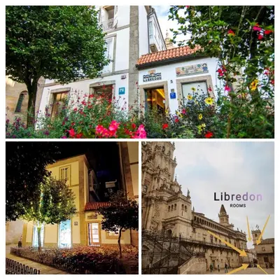 a building with a bunch of plants in front of it at Libredón Rooms in Santiago de Compostela