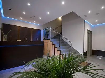 a staircase in a house with a stair case at Complejo O Piñeiral A Fonsagrada in Fonsagrada