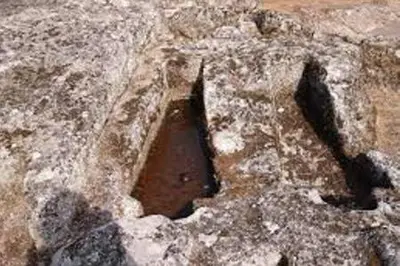 a rock formation with a hole in it at Duplex Familiar in Ribadavia