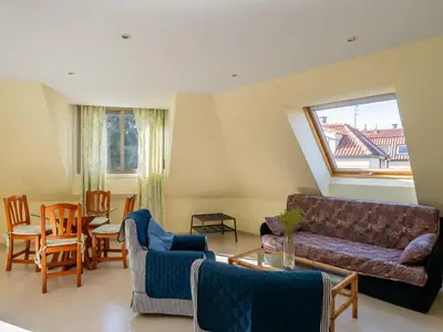 a living room with a couch and chairs at Apartment Edificio Bahia II by Interhome in Miño