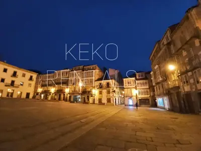 an empty street at night in a city at Ría de Viveiro in Vivero